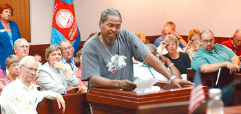 Don Wooten speaking at county commissioners meeting