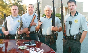 Officers with confiscated items