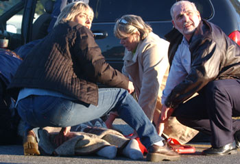 People watching over injured student