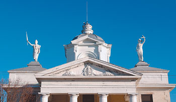 Statues of Justice and Liberty on top of Goldsboro City Hall