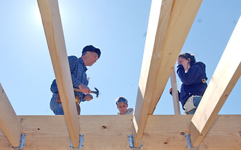 Students working on Habitat house