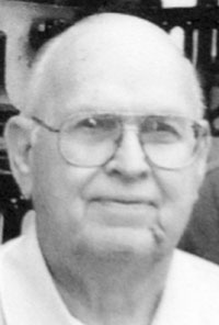 GEORGE E. YELVERTON