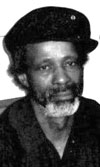 ELBERT M. HOLLOMAN