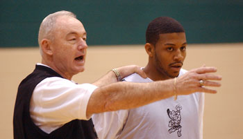 Mount Olive College men's basketball coach Bill Clingan and Victor Young